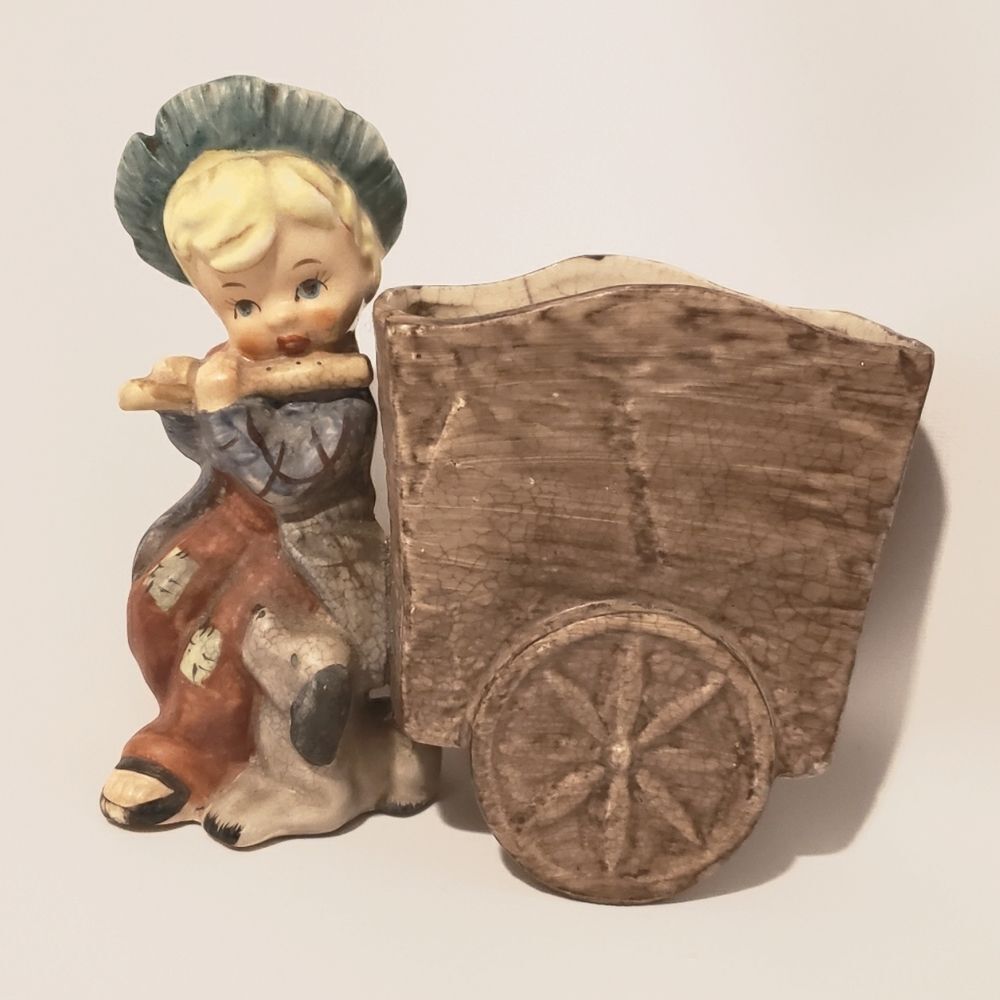 Hummel like planter Boy playing Flute